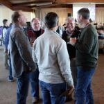 a group of people standing in a room